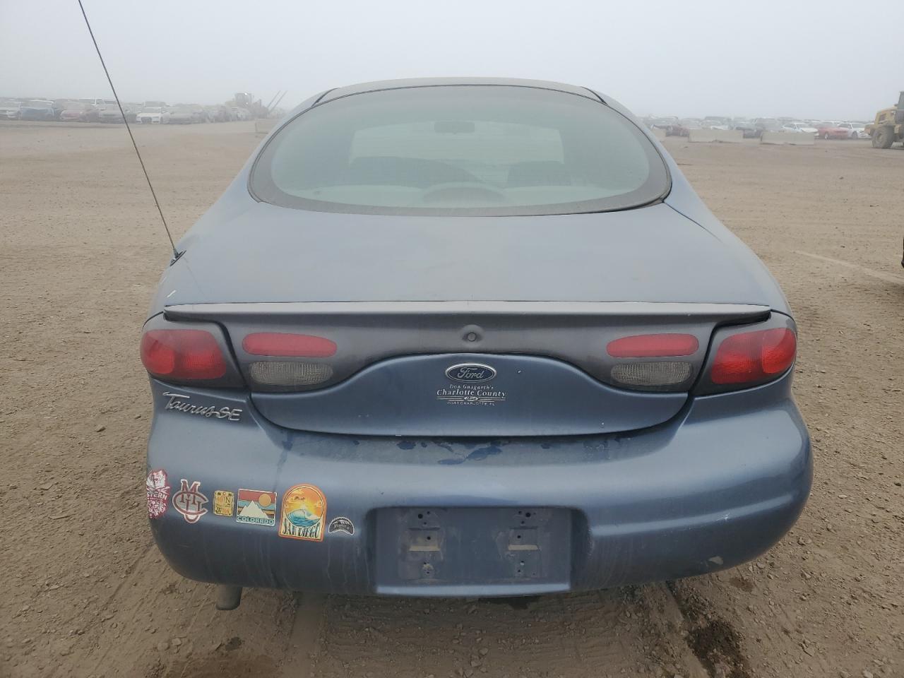 1999 Ford Taurus Se VIN: 1FAFP53S1XA189557 Lot: 86699955