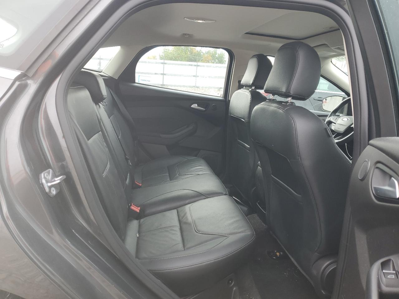 2017 Ford Focus Titanium VIN: 1FADP3N23HL243147 Lot: 82672225