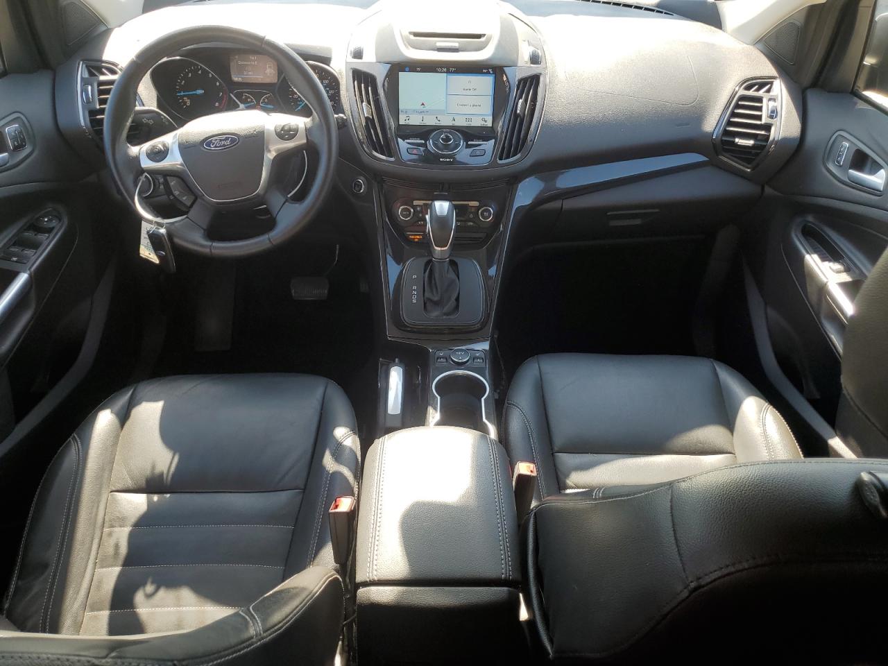 2016 Ford Escape Titanium VIN: 1FMCU0JX0GUA07493 Lot: 84804645