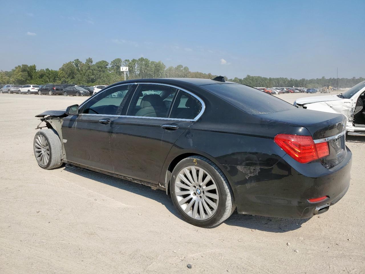 2012 BMW 750 I VIN: WBAKA8C57CDS99699 Lot: 82007895