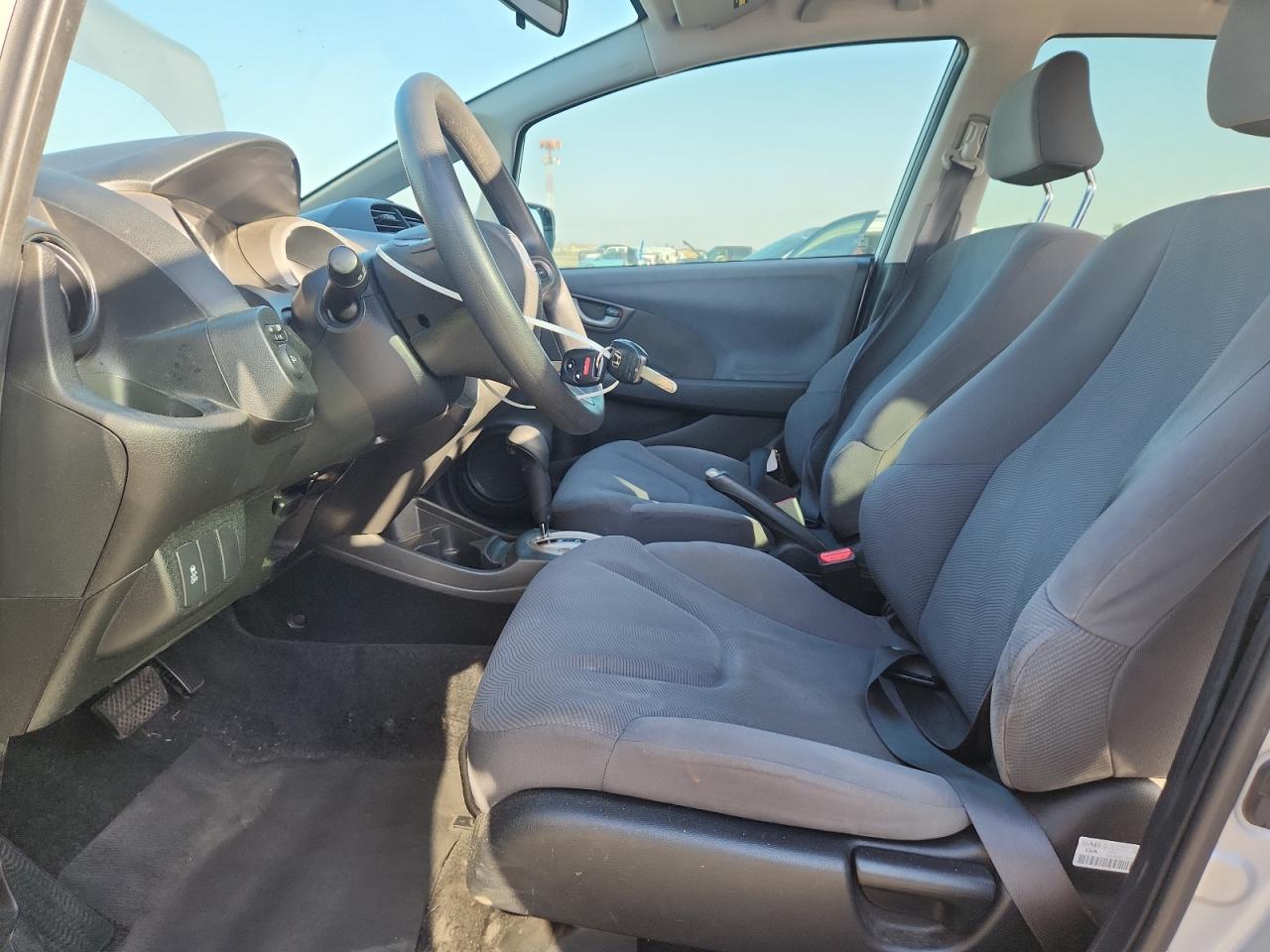 2011 Honda Fit VIN: JHMGE8H36BS002726 Lot: 82397515