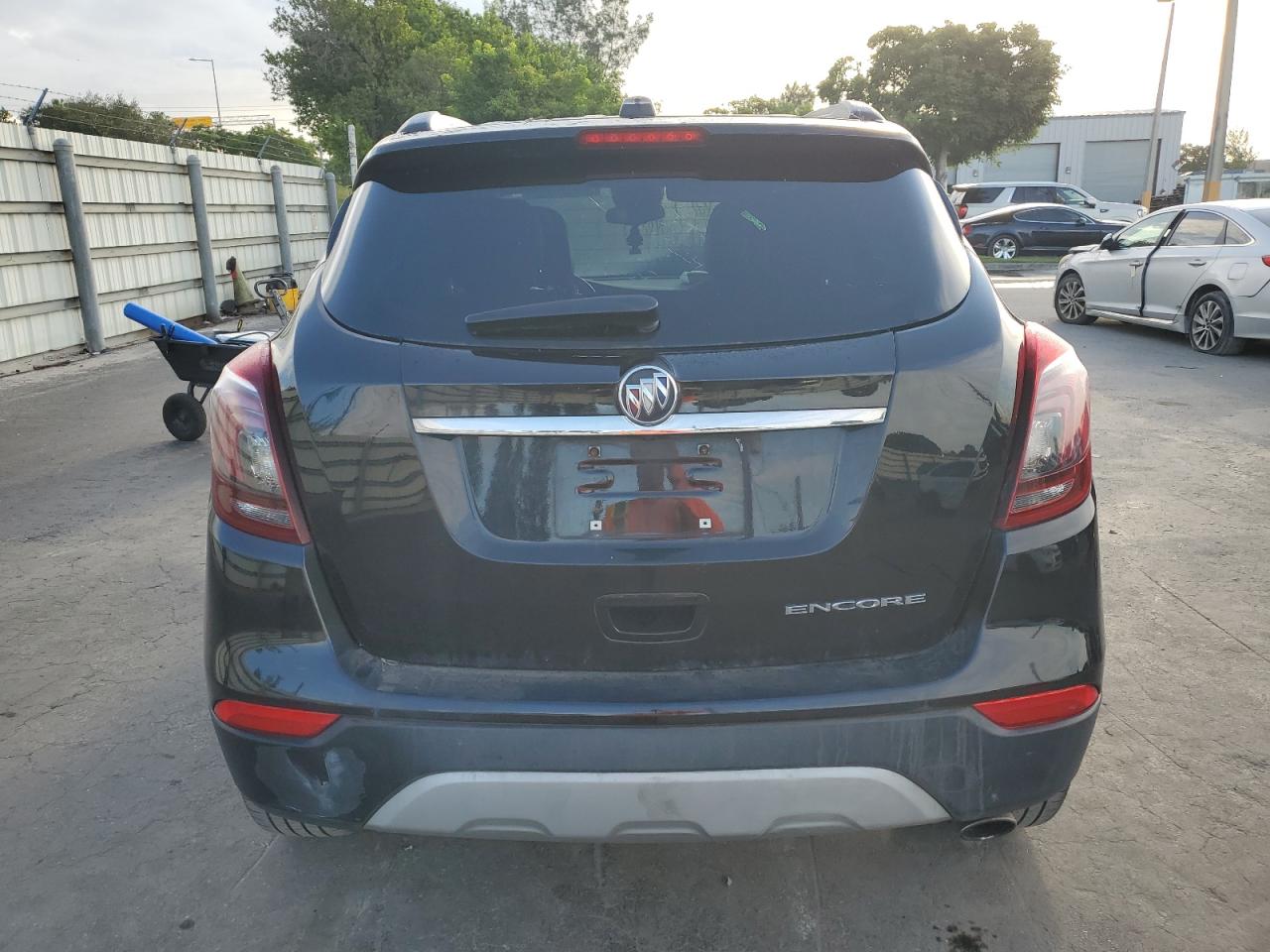 2021 Buick Encore Preferred VIN: KL4CJASB3MB323977 Lot: 85553055