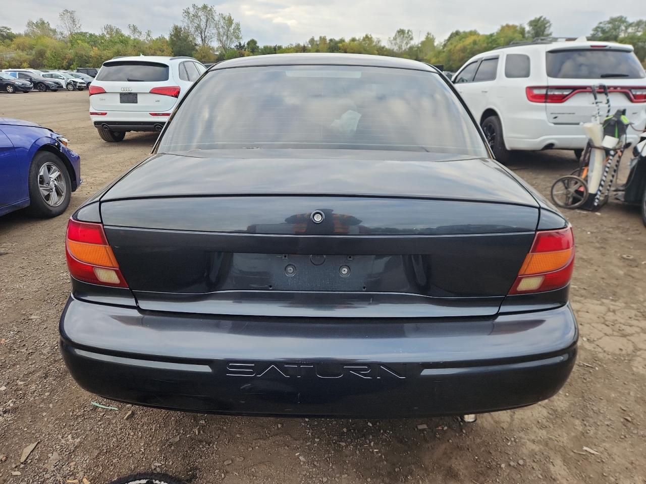 2000 Saturn Sl1 VIN: 1G8ZG5288YZ249330 Lot: 86113035