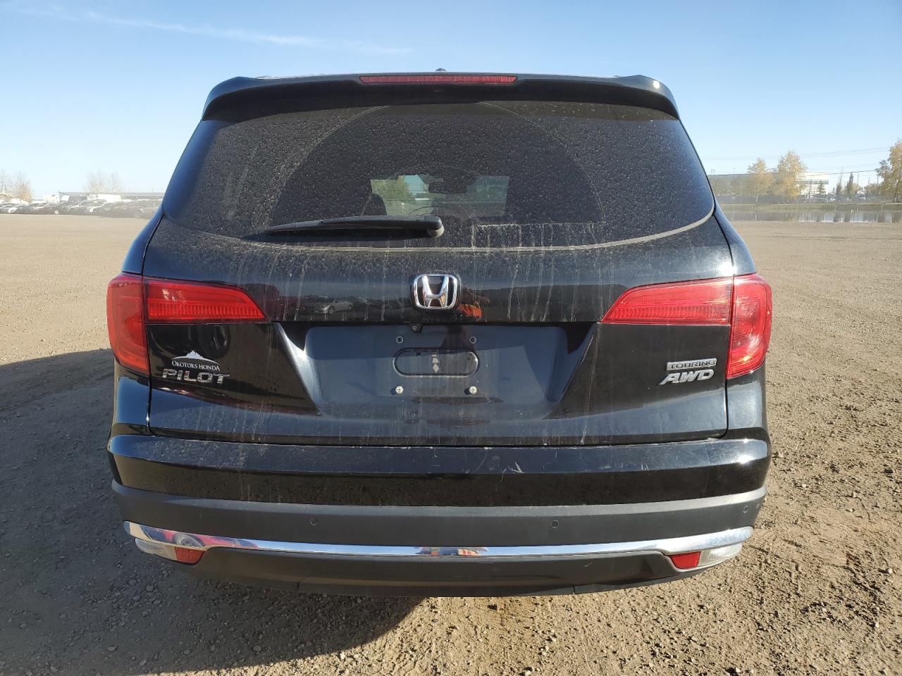 2017 Honda Pilot Touring VIN: 5FNYF6H90HB500972 Lot: 84559435