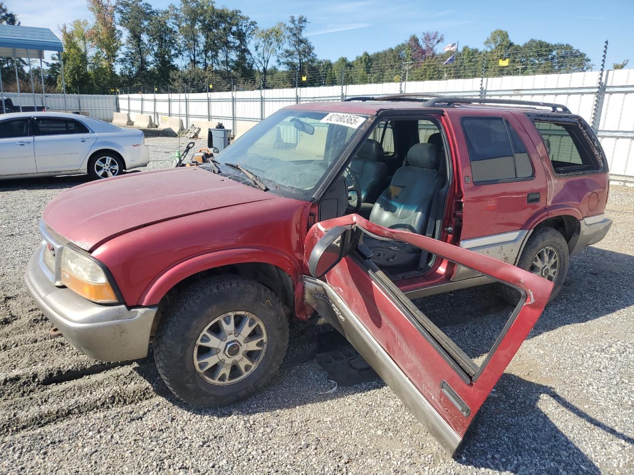 GMC JIMMY 2000. Lot# 82180365. VIN 1GKDT13W5Y2166405. Photo 1