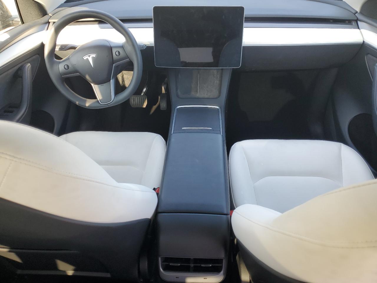 2023 Tesla Model Y VIN: 7SAYGAEE2PF646213 Lot: 84785885