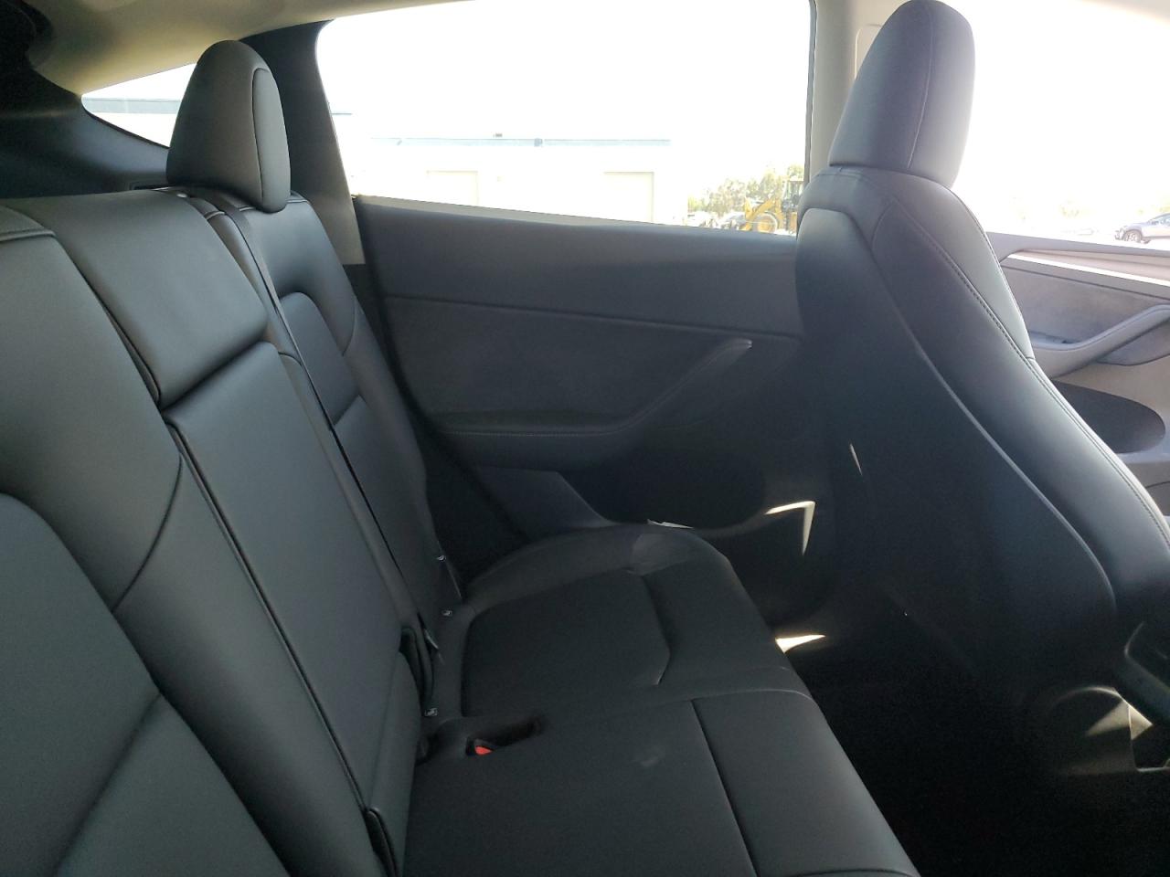 2025 Tesla Model Y VIN: 7SAYGDED2SF218708 Lot: 89476395