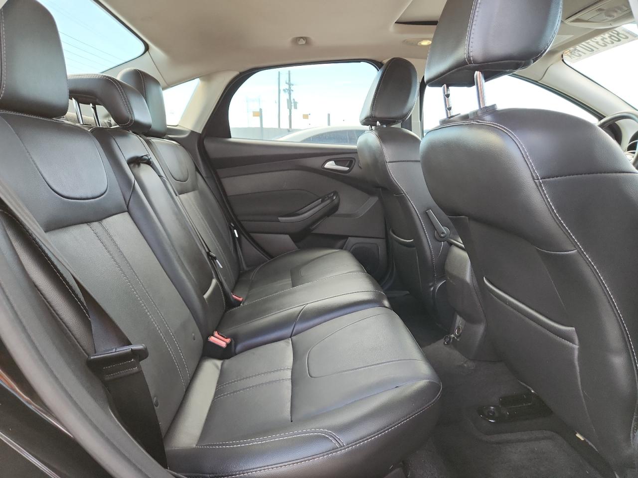 2014 Ford Focus Titanium VIN: 1FADP3J28EL224272 Lot: 86531015