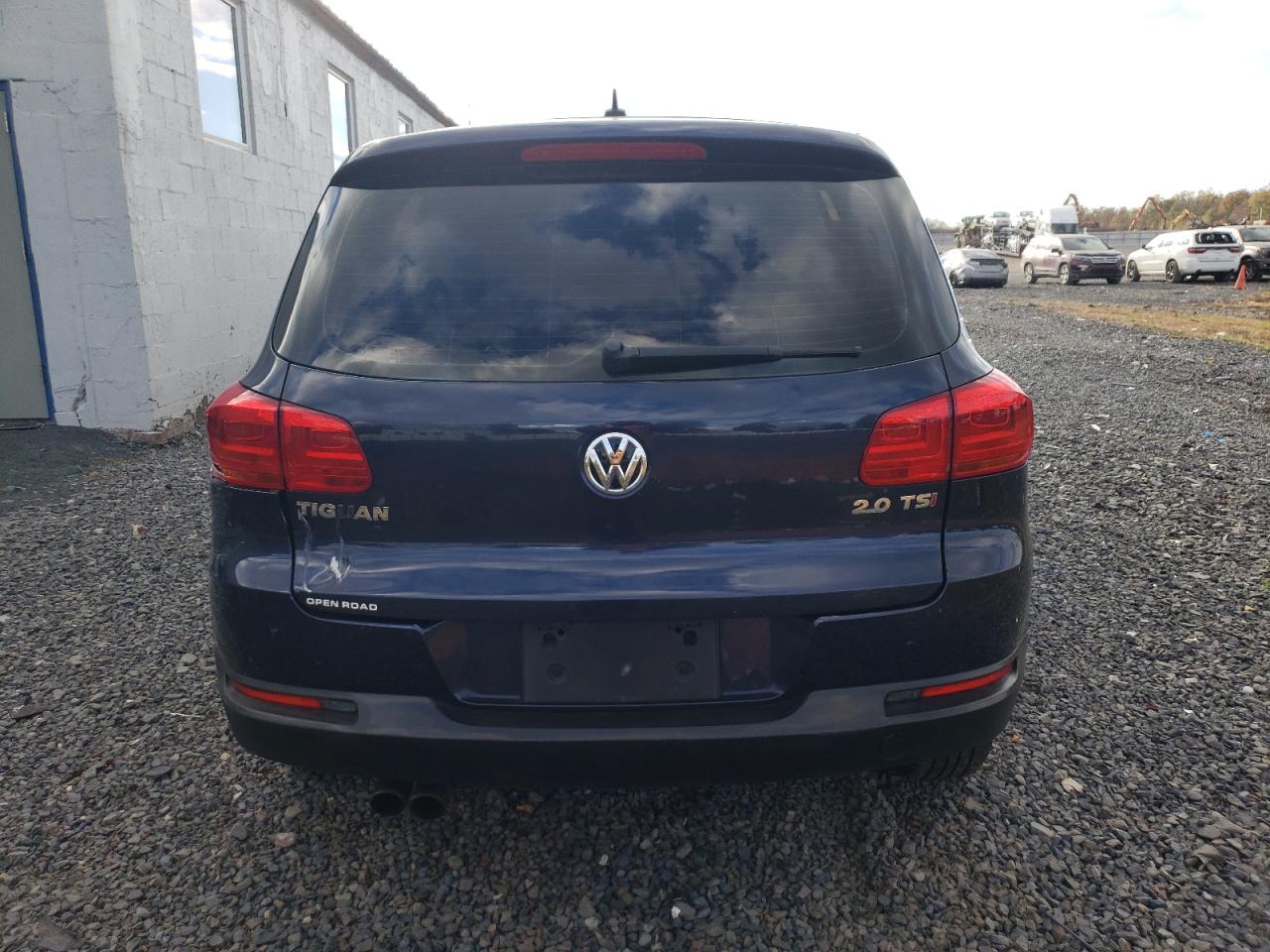 2014 Volkswagen Tiguan S VIN: WVGAV3AX0EW571393 Lot: 89877165