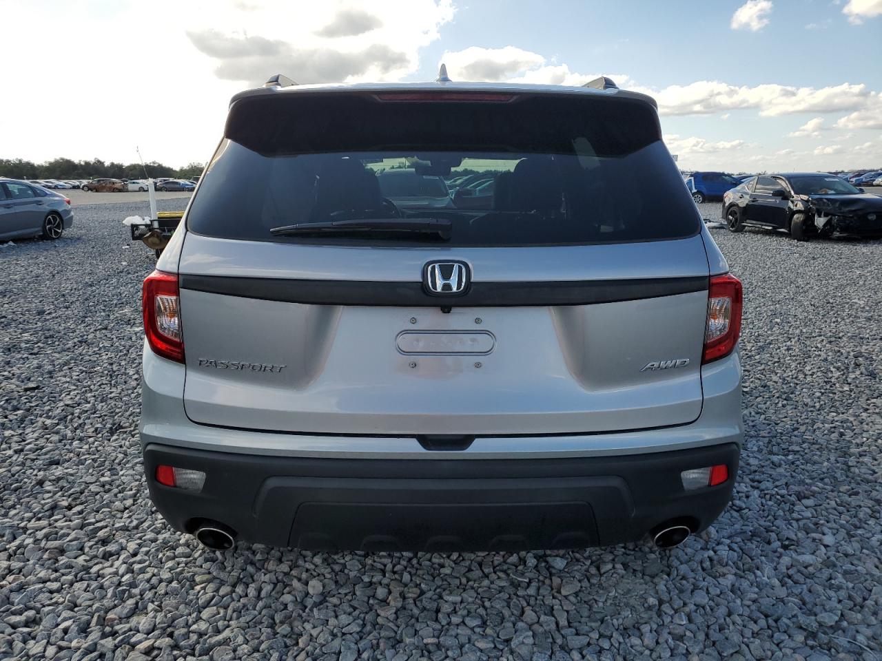 2020 Honda Passport Exl VIN: 5FNYF8H51LB020148 Lot: 90519935