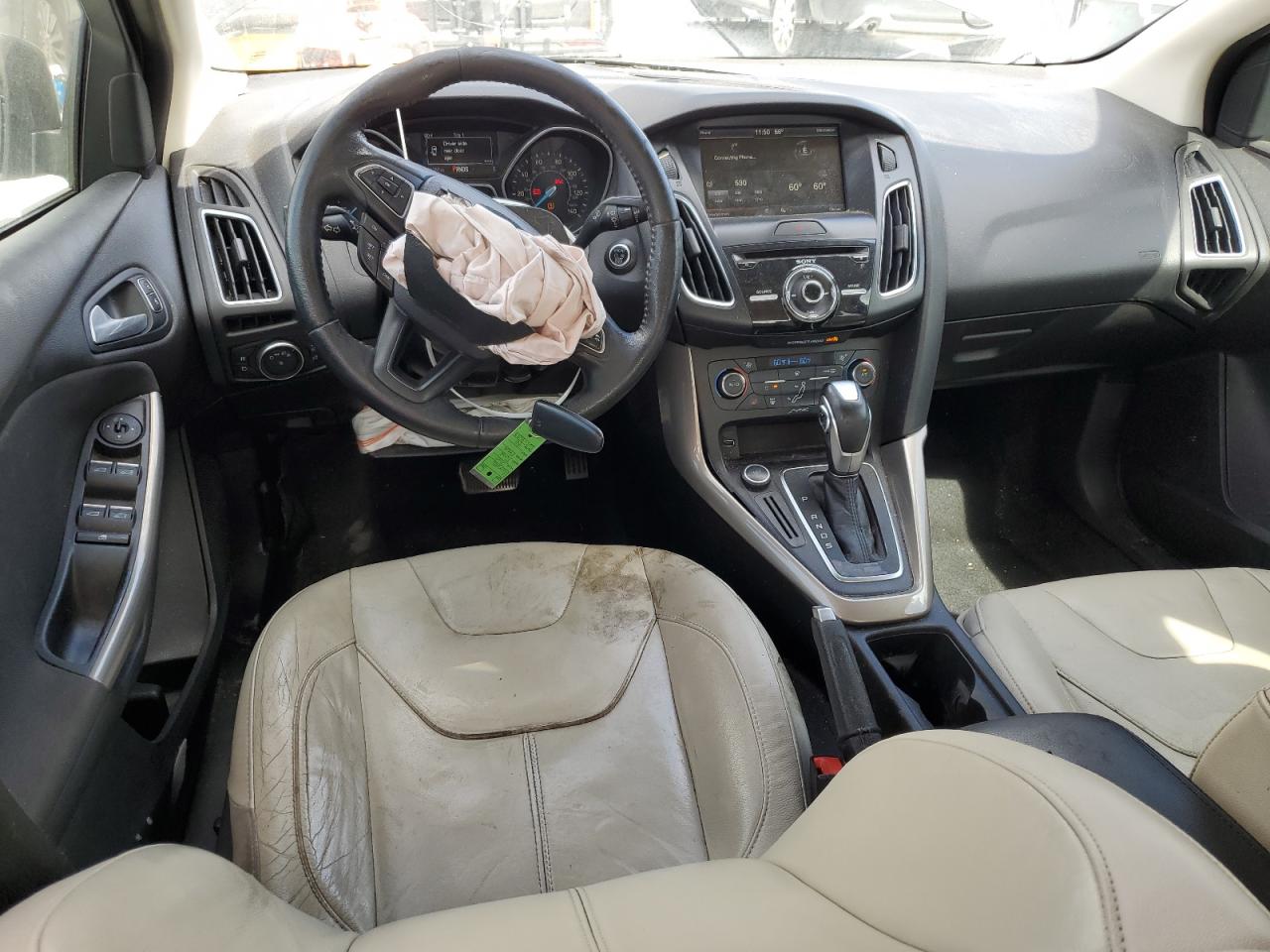 2015 Ford Focus Titanium VIN: 1FADP3J27FL322047 Lot: 82182475