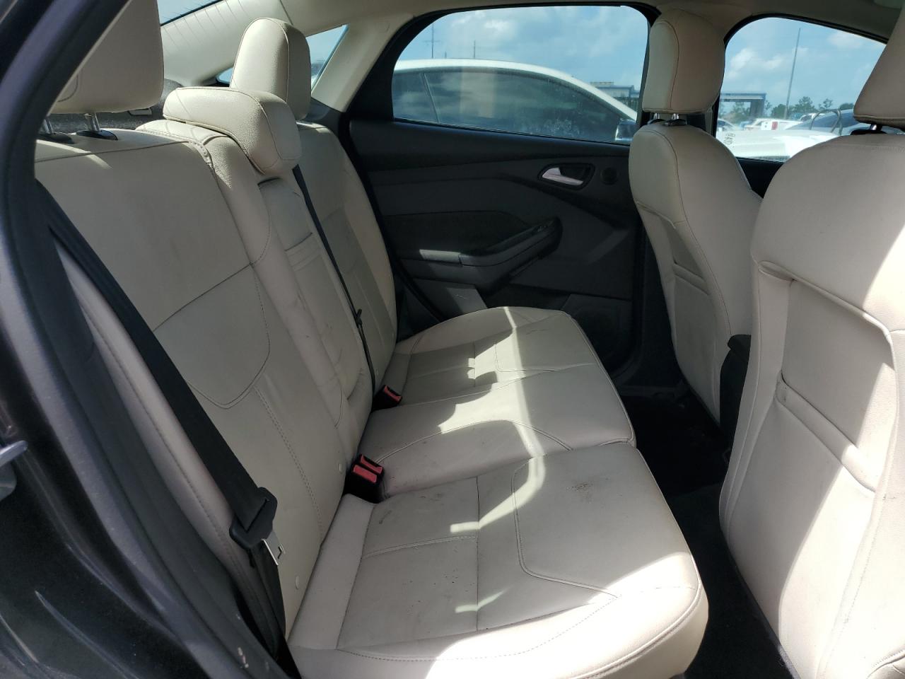 2015 Ford Focus Titanium VIN: 1FADP3J27FL322047 Lot: 82182475