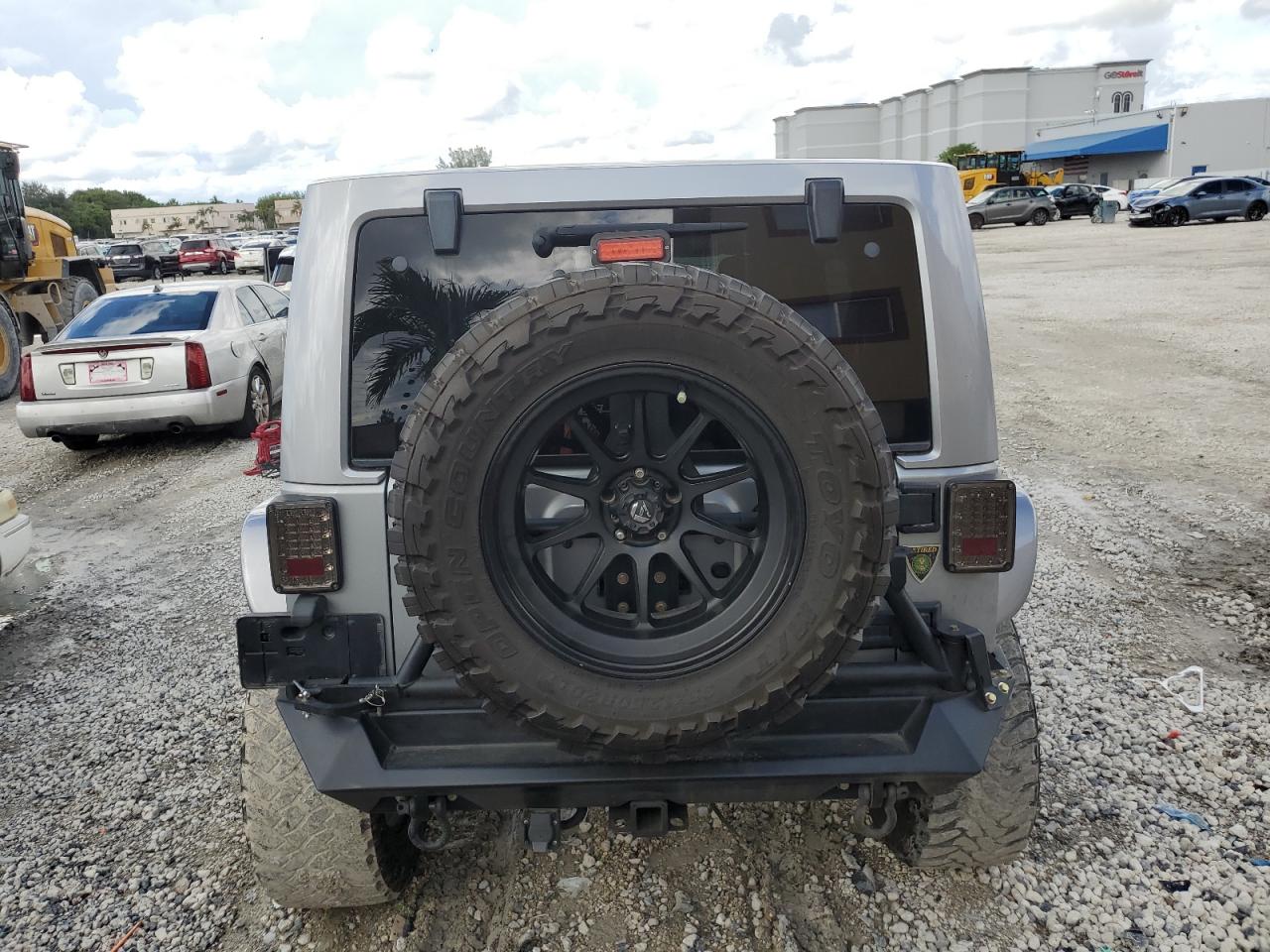 2014 Jeep Wrangler Unlimited Rubicon VIN: 1C4BJWFG8EL296775 Lot: 85949555