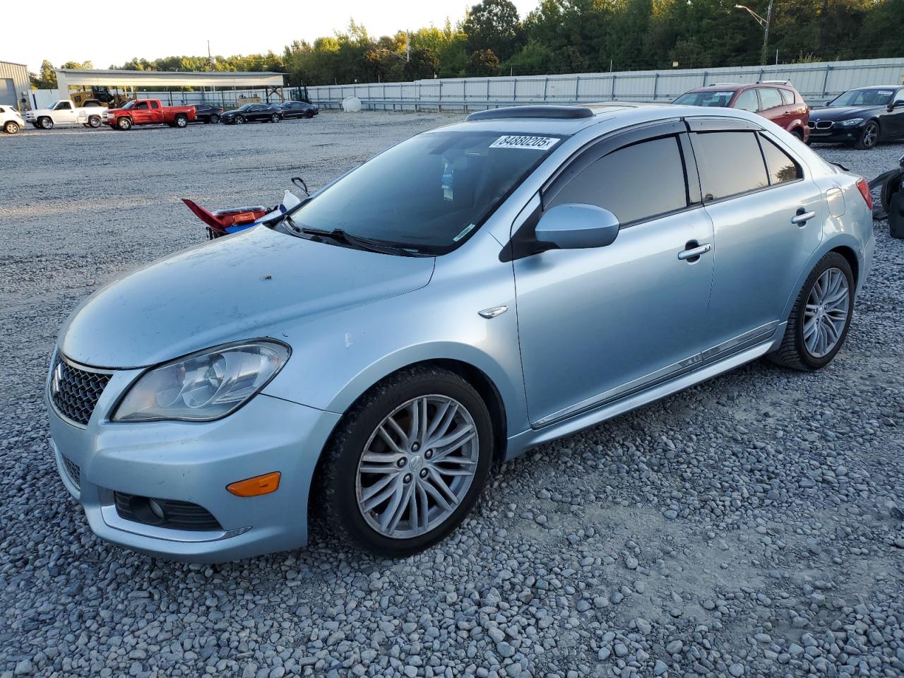 SUZUKI KIZASHI 2011. Lot# 84880205. VIN JS2RE9A89B6110780. Photo 1