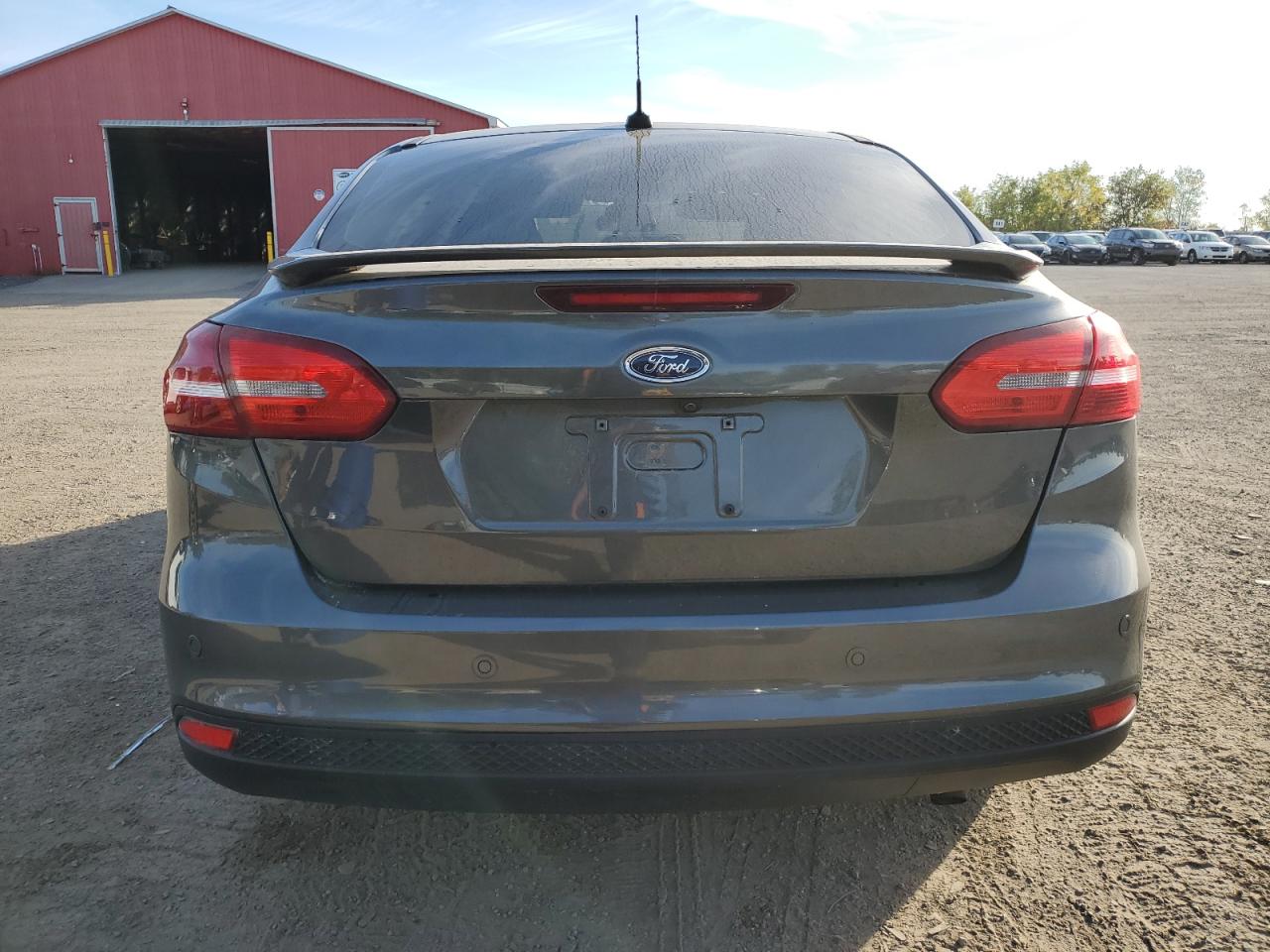 2016 Ford Focus Titanium VIN: 1FADP3J25GL312604 Lot: 85146455