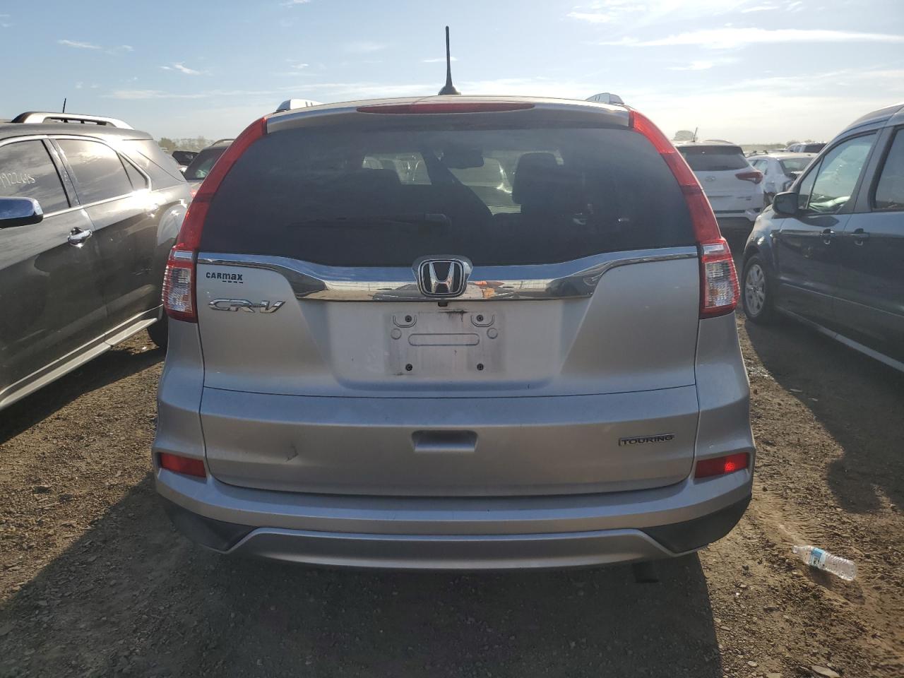 2016 Honda Cr-V Touring VIN: 5J6RM3H92GL009396 Lot: 84245255