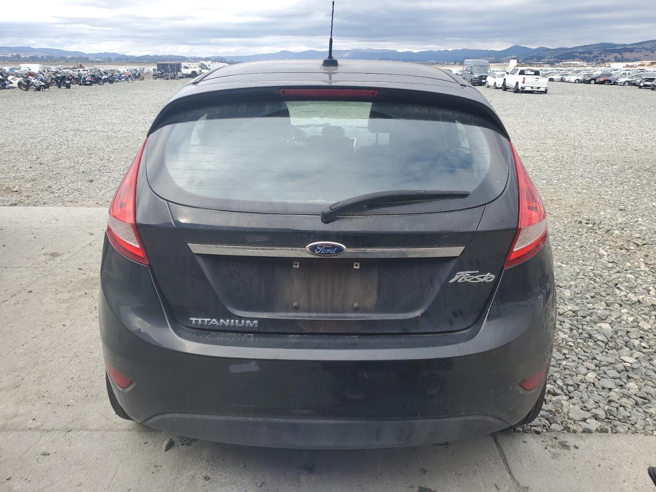 2013 Ford Fiesta Titanium VIN: 3FADP4FJ2DM205543 Lot: 84838205