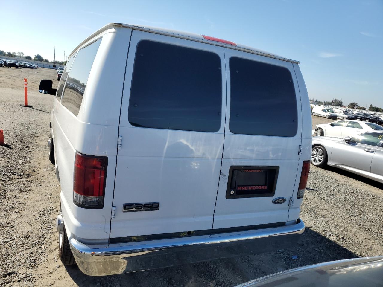 2006 Ford Econoline E350 Super Duty Wagon VIN: 1FBNE31L86DA37773 Lot: 82457695