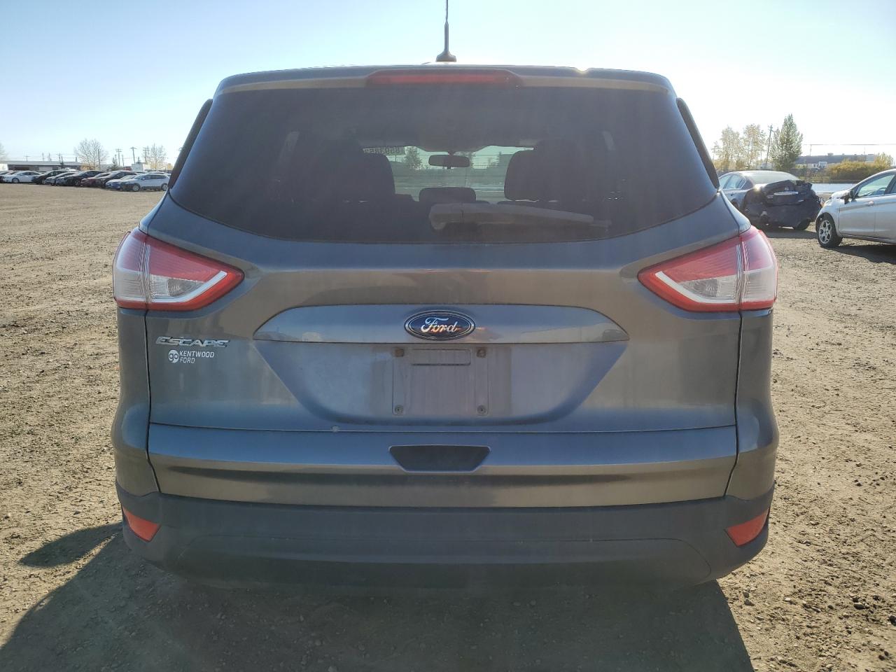 2014 Ford Escape S VIN: 1FMCU0F77EUC25727 Lot: 85938535
