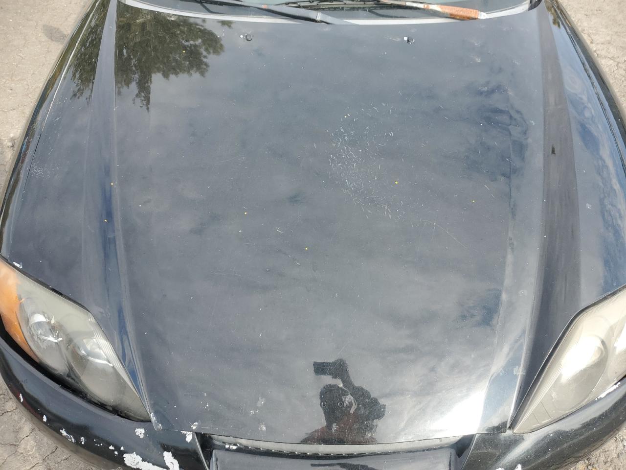 2003 Hyundai Tiburon Gt VIN: KMHHN65F13U077098 Lot: 85950065