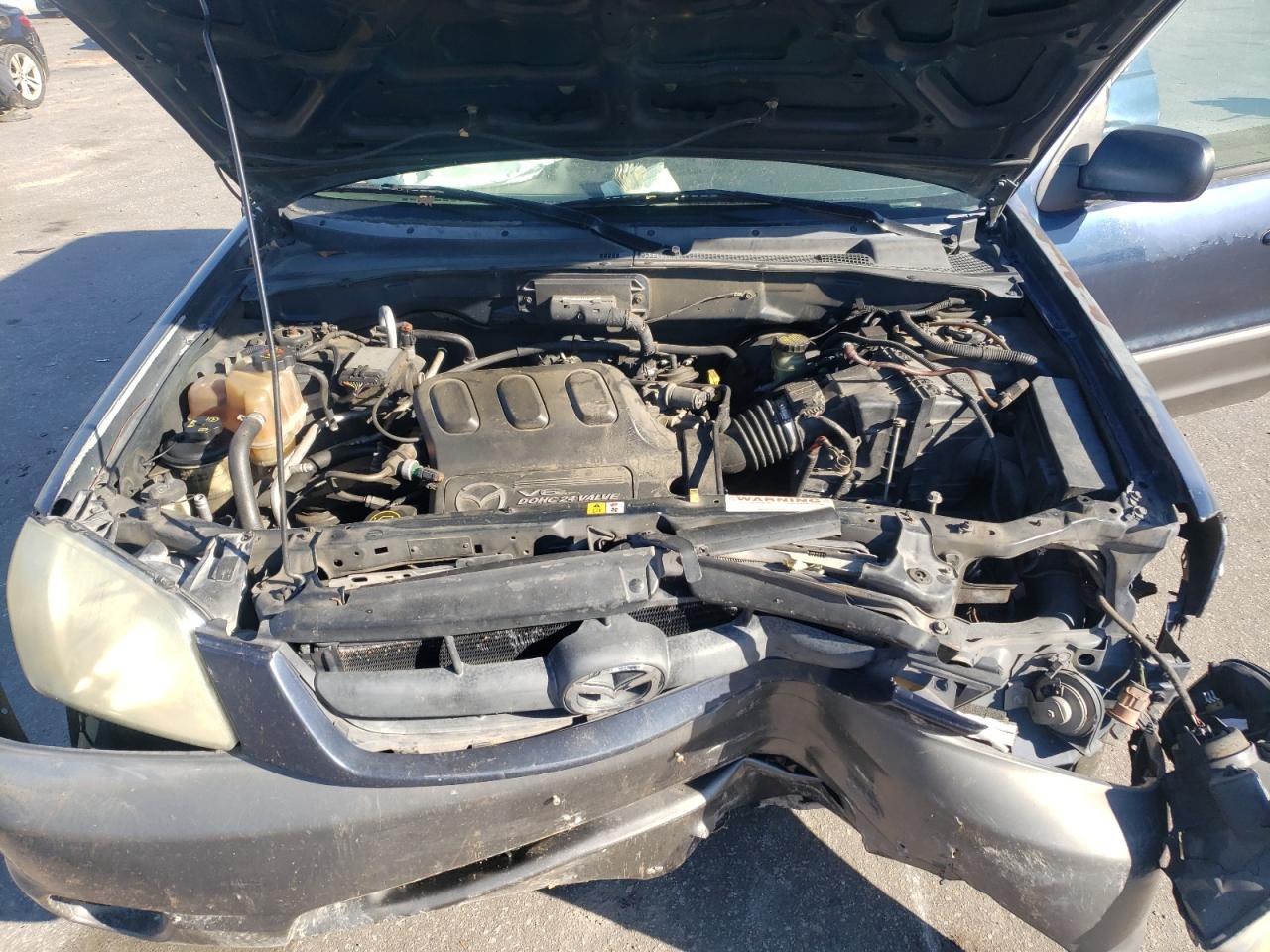 2003 Mazda Tribute Es VIN: 4F2CZ06103KM38447 Lot: 82524125