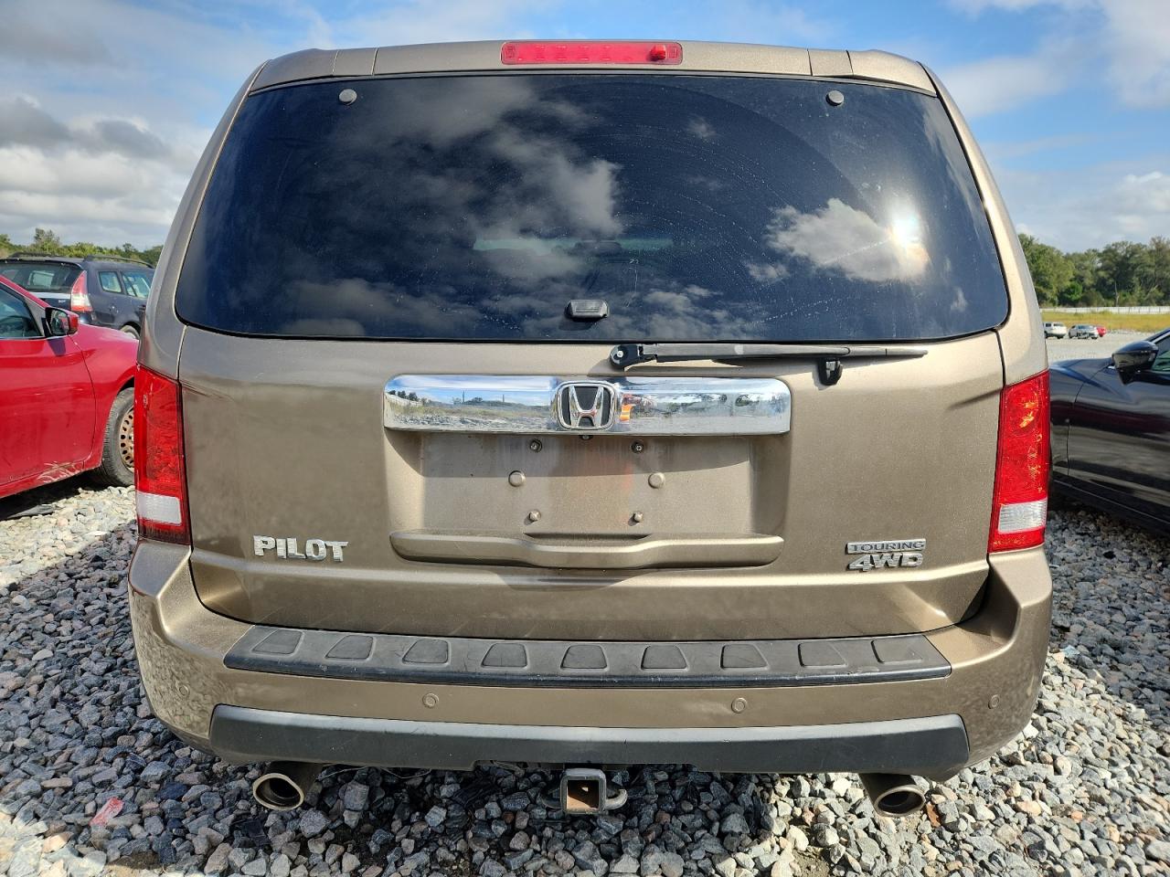 2010 Honda Pilot Touring VIN: 5FNYF4H98AB039661 Lot: 85287425