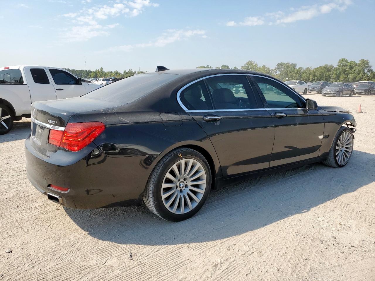 2012 BMW 750 I VIN: WBAKA8C57CDS99699 Lot: 82007895