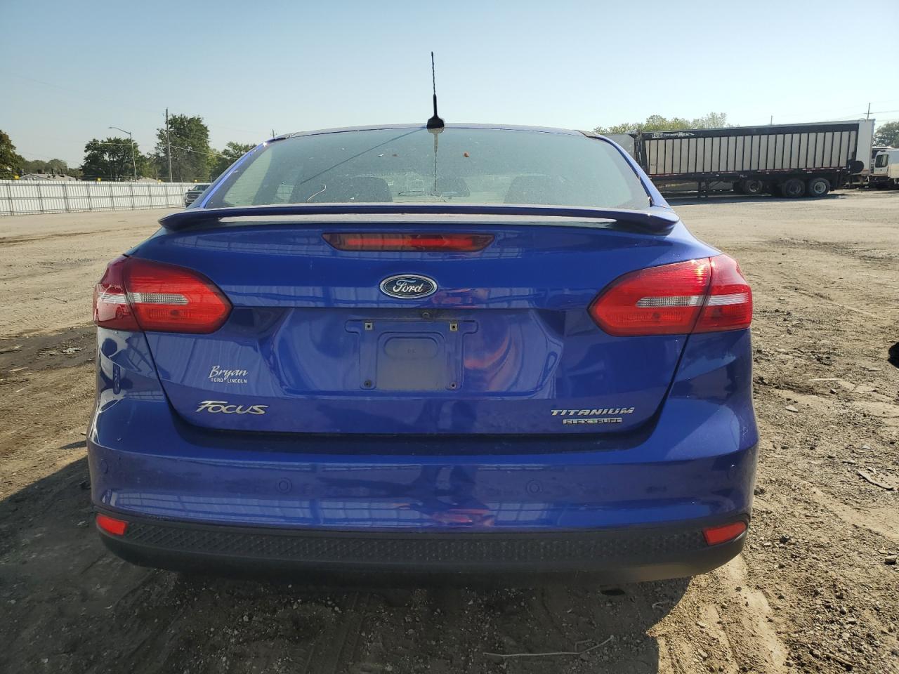 2015 Ford Focus Titanium VIN: 1FADP3J21FL363273 Lot: 85180025
