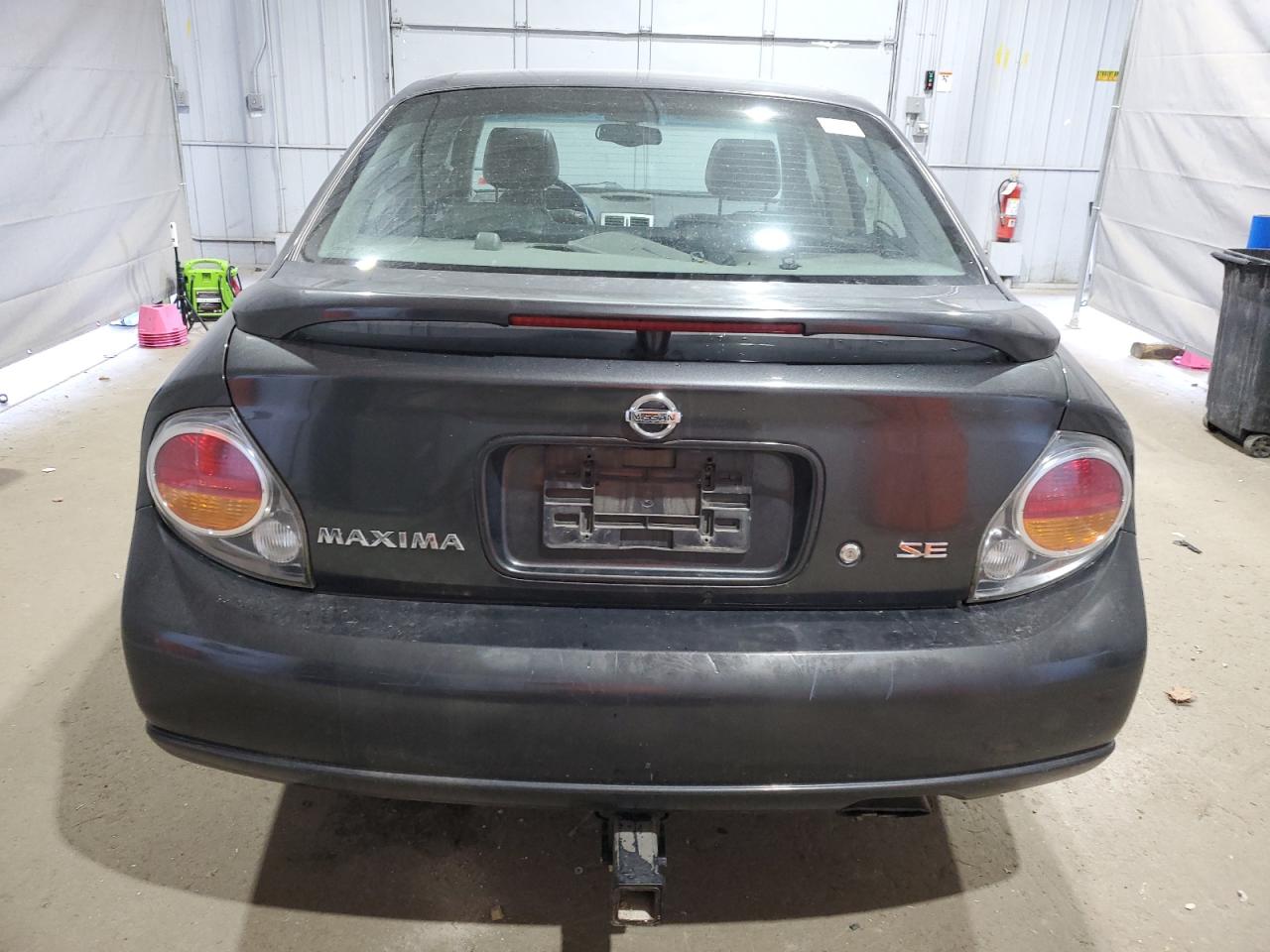 2003 Nissan Maxima Gle VIN: JN1DA31AX3T404730 Lot: 82770465