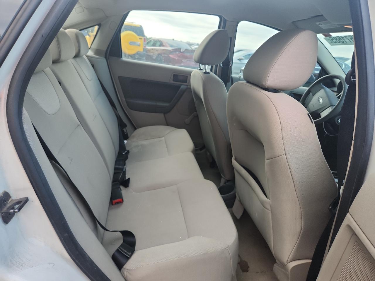 2009 Ford Focus S VIN: 1FAHP34N69W133464 Lot: 85571585