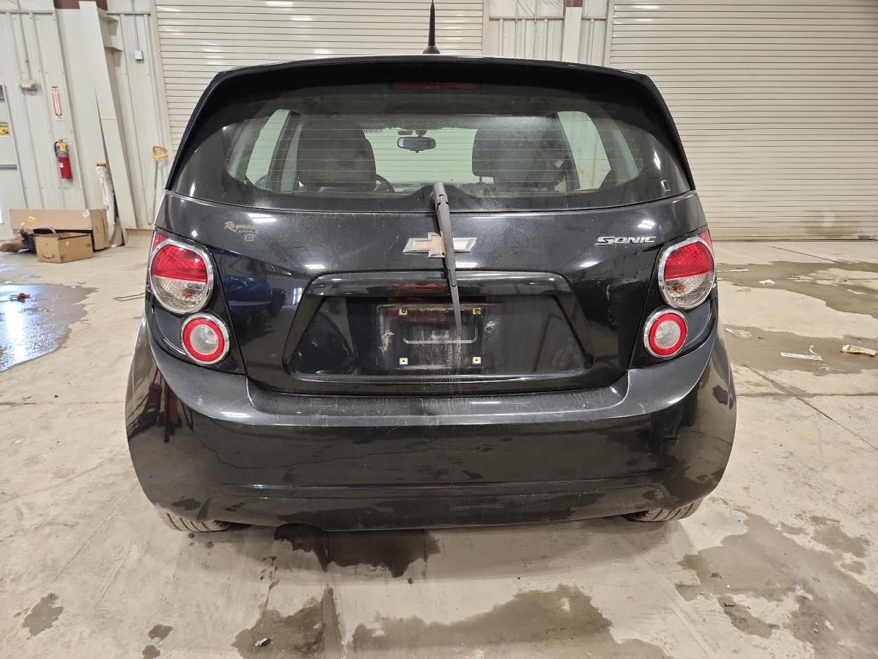 2014 Chevrolet Sonic Ls VIN: 1G1JA6SH9E4144825 Lot: 90061235