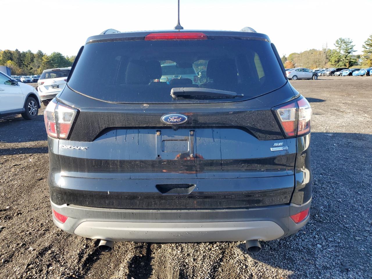 2018 Ford Escape Se VIN: 1FMCU9GD4JUB37138 Lot: 87100275
