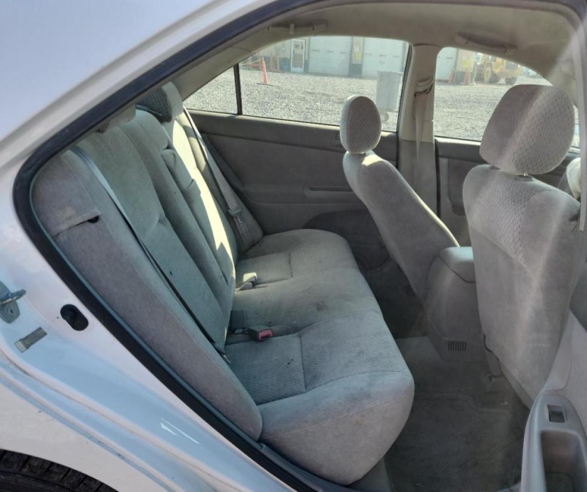 2003 Toyota Camry Le VIN: JTDBE32K930158108 Lot: 82230575