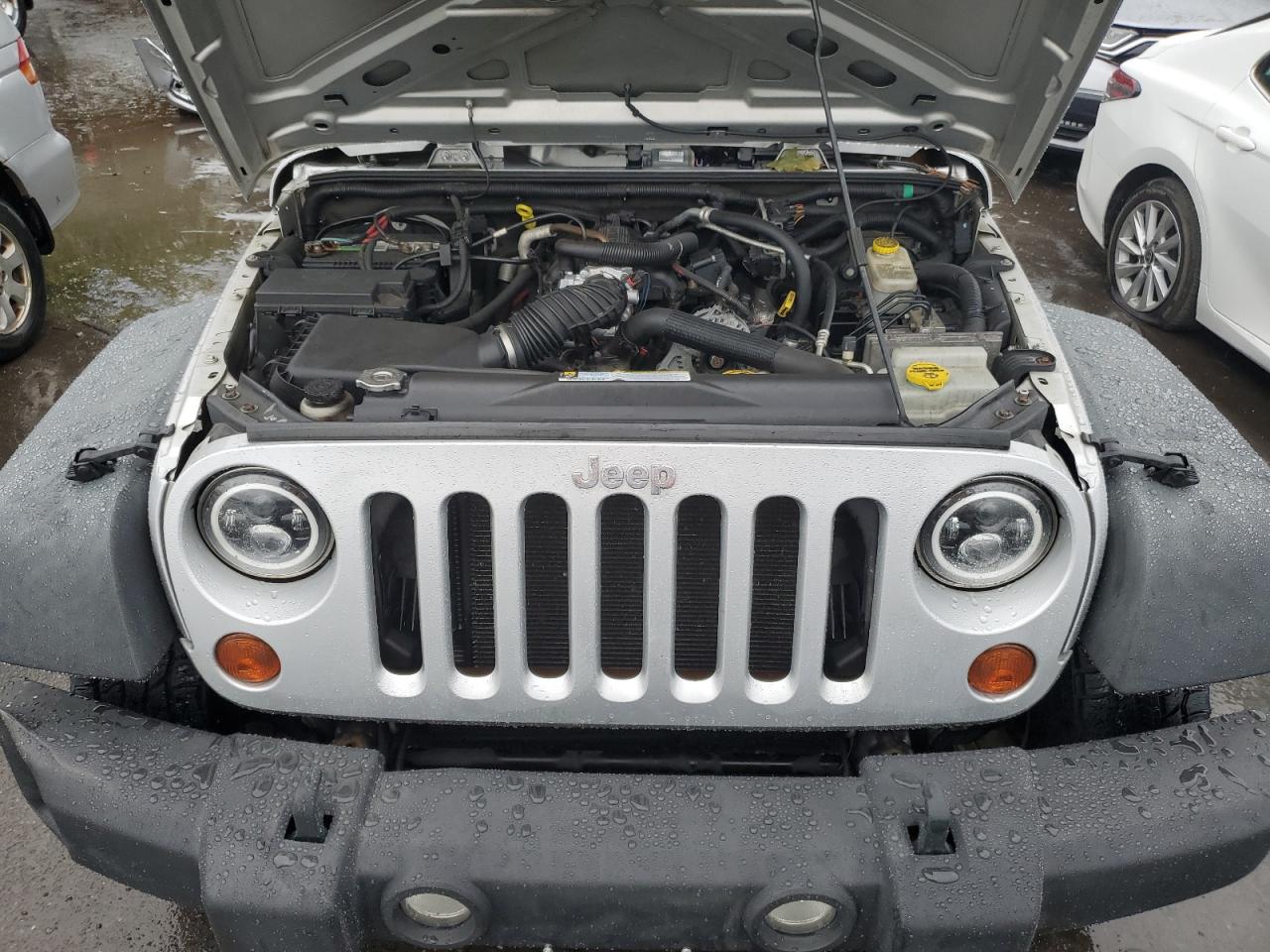 2011 Jeep Wrangler Unlimited Sport VIN: 1J4HA3H13BL551212 Lot: 85692335