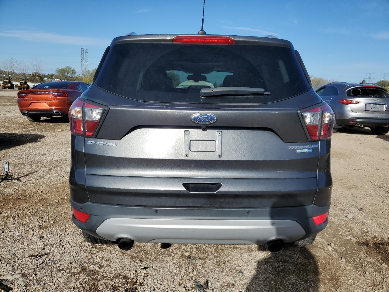 2017 Ford Escape Titanium VIN: 1FMCU9J95HUA63792 Lot: 87097625