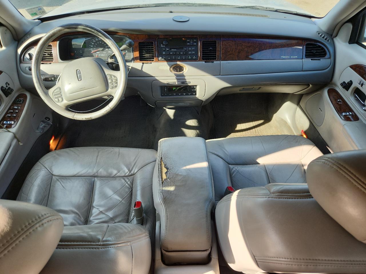 1998 Lincoln Town Car Cartier VIN: 1LNFM83W6WY702858 Lot: 85010175