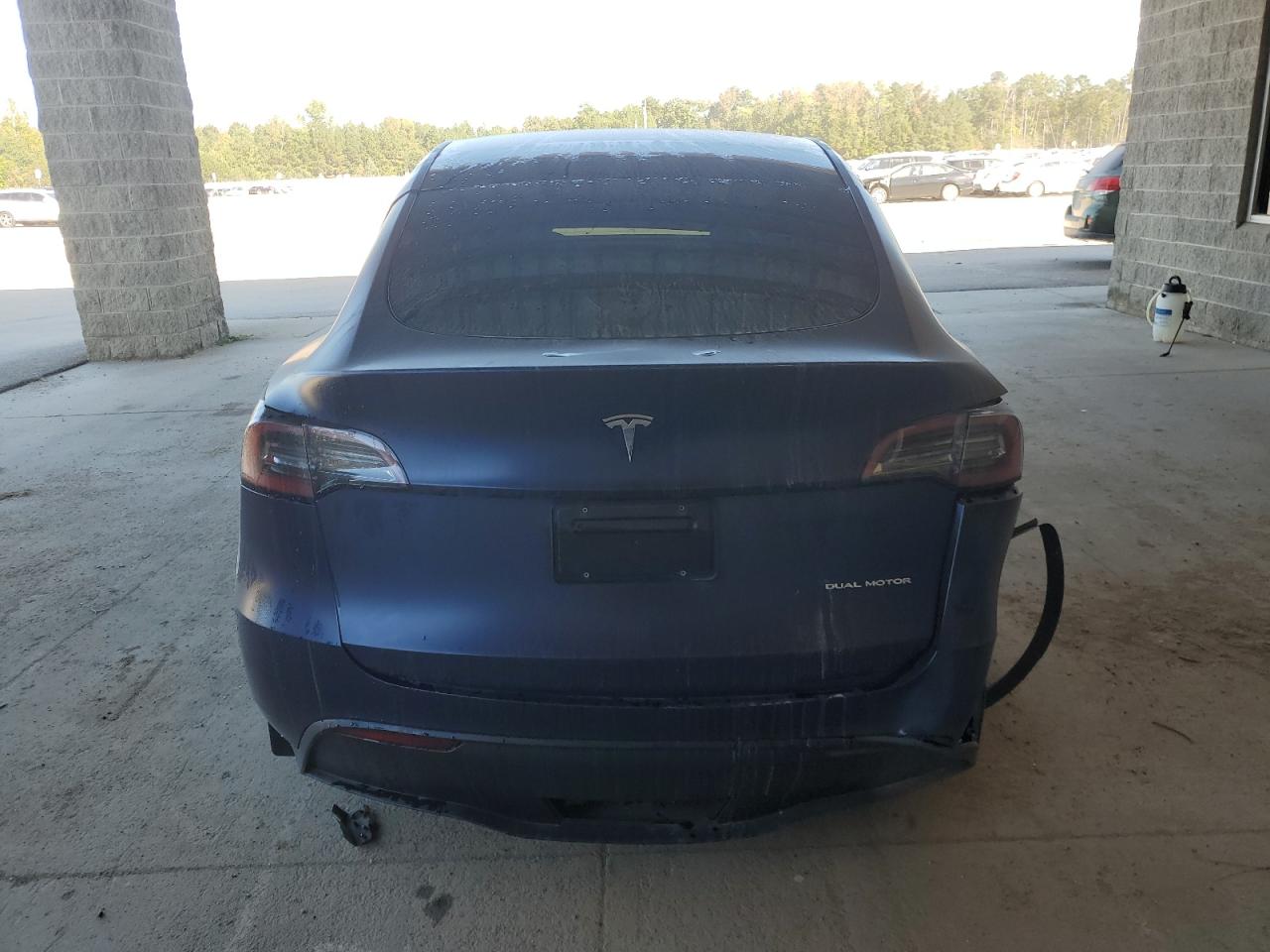 2023 Tesla Model Y VIN: 7SAYGAEE7PF697030 Lot: 66730665
