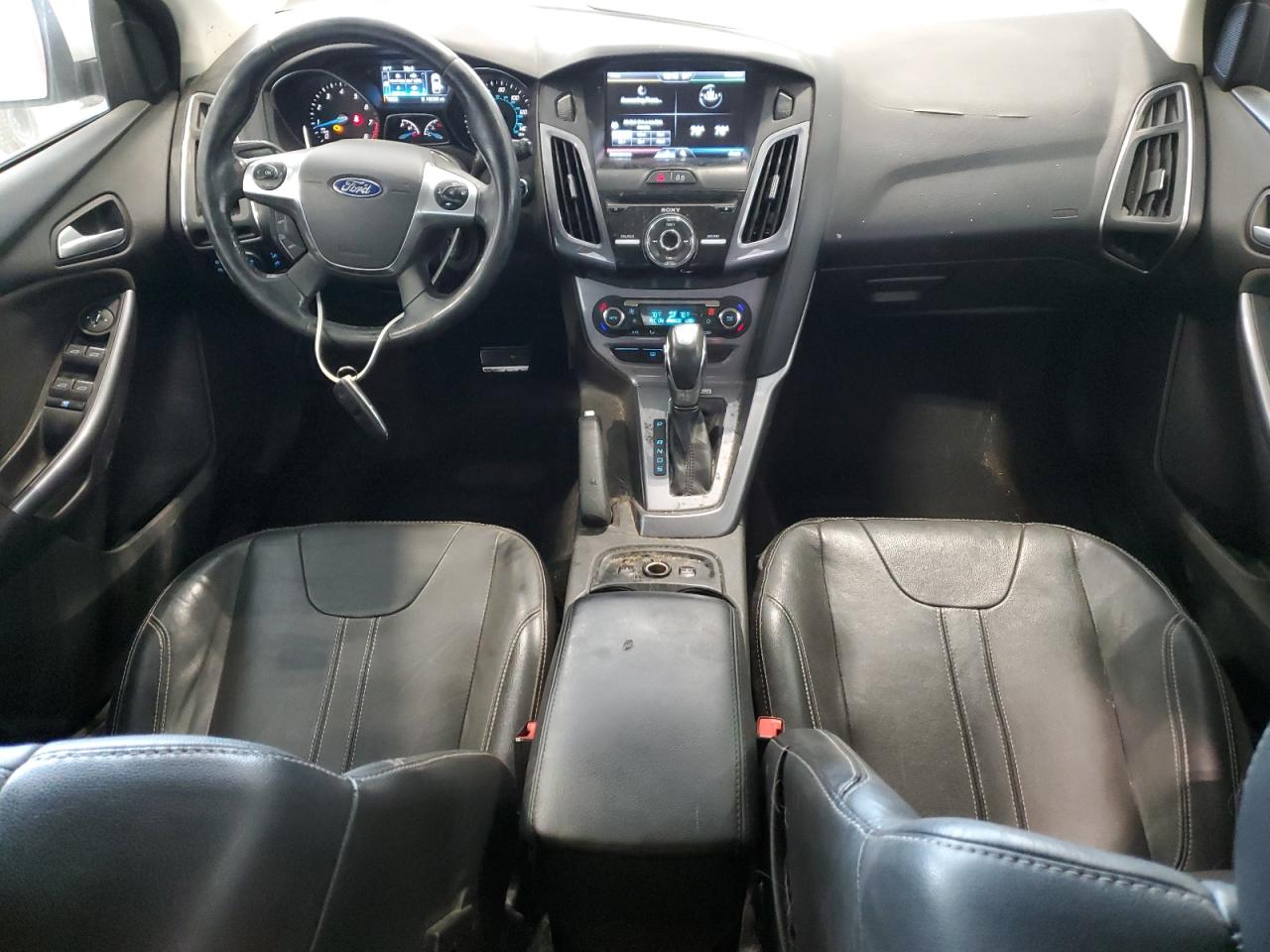 2014 Ford Focus Titanium VIN: 1FADP3N26EL387948 Lot: 84660025