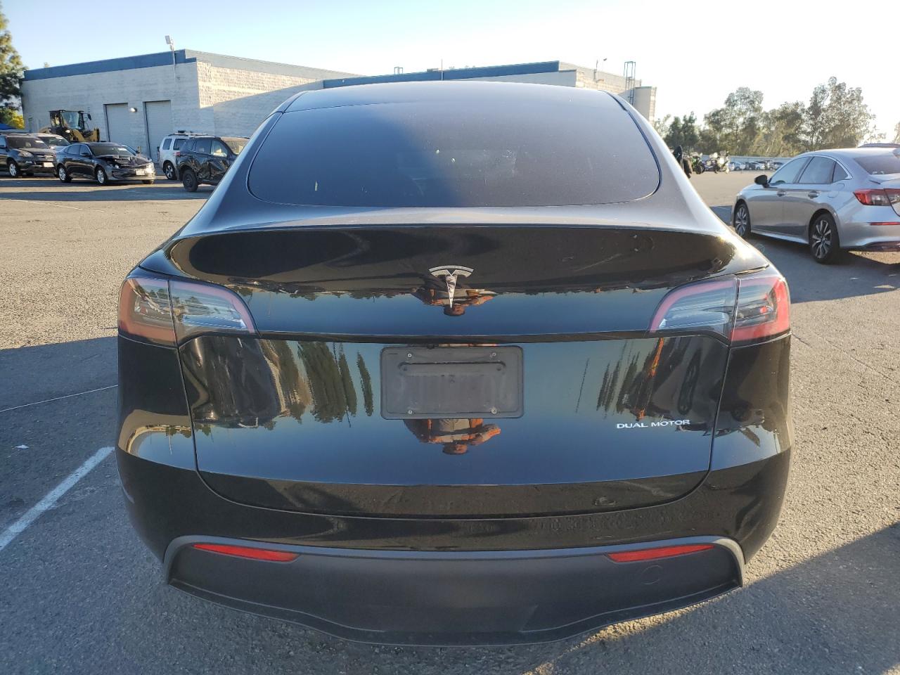 2023 Tesla Model Y VIN: 7SAYGAEE3PF833606 Lot: 87250475
