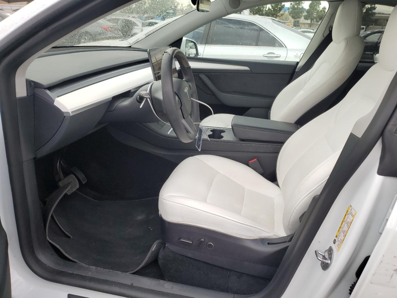 2023 Tesla Model Y VIN: 7SAYGDEE3PF607180 Lot: 85250685