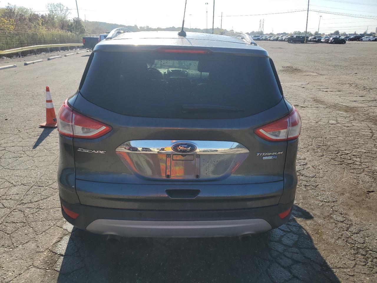 2016 Ford Escape Titanium VIN: 1FMCU9J9XGUA80876 Lot: 86617575