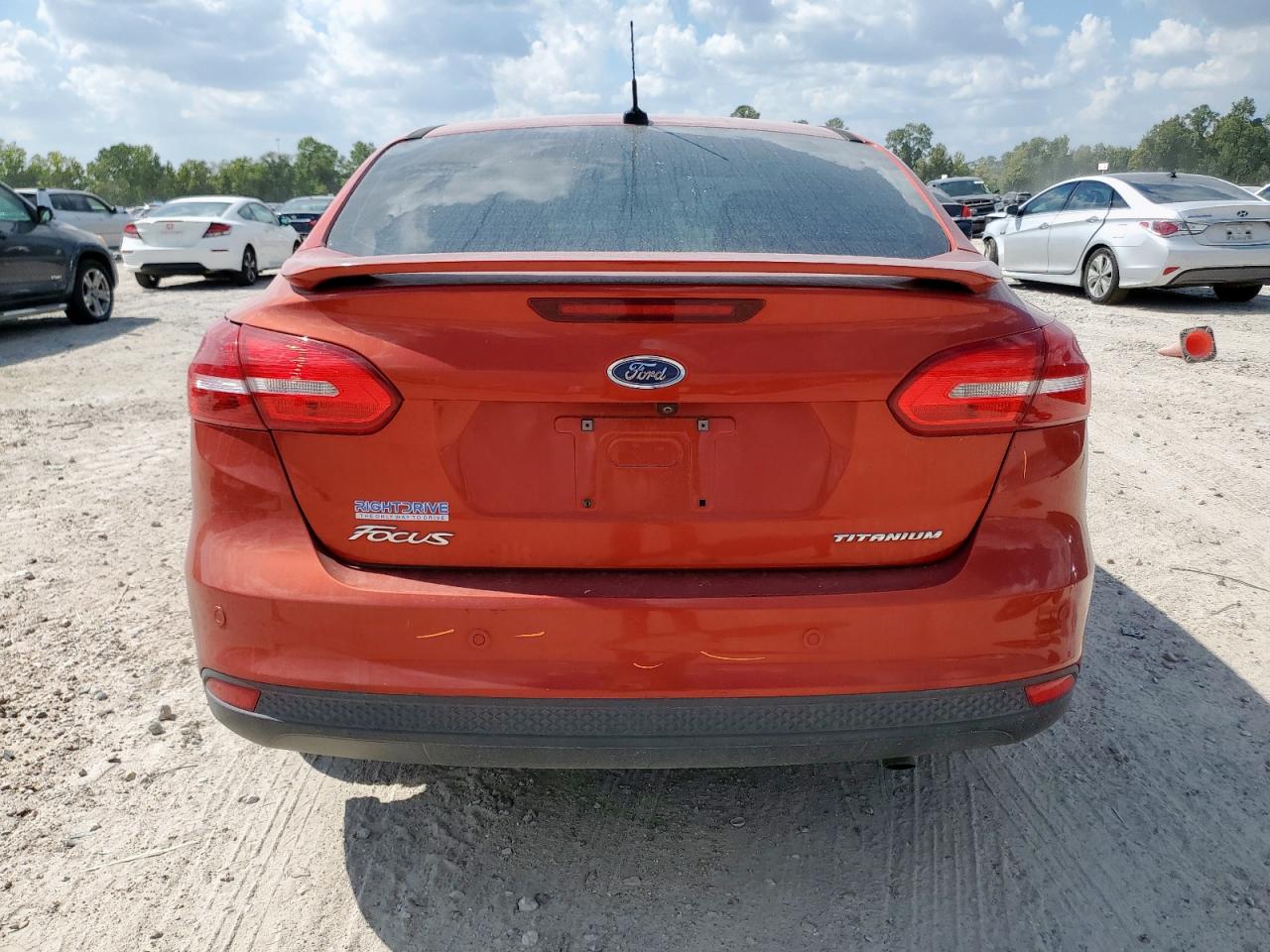 2018 Ford Focus Titanium VIN: 1FADP3J2XJL249989 Lot: 82187775