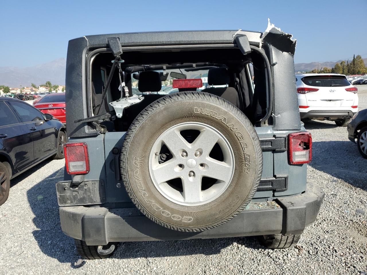 2015 Jeep Wrangler Sport VIN: 1C4AJWAG5FL677178 Lot: 85362775