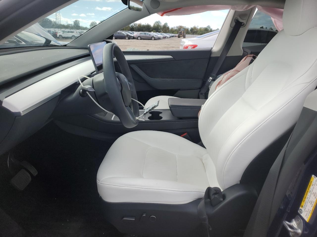 2023 Tesla Model Y VIN: 7SAYGDEE3PF799457 Lot: 82439205