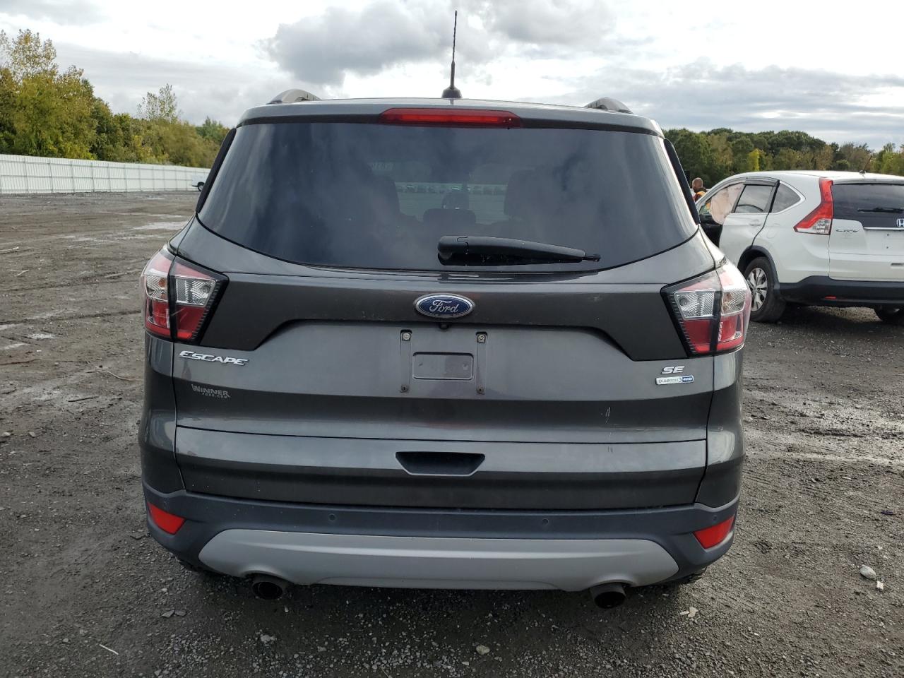 2017 Ford Escape Se VIN: 1FMCU9G94HUE00038 Lot: 81904785
