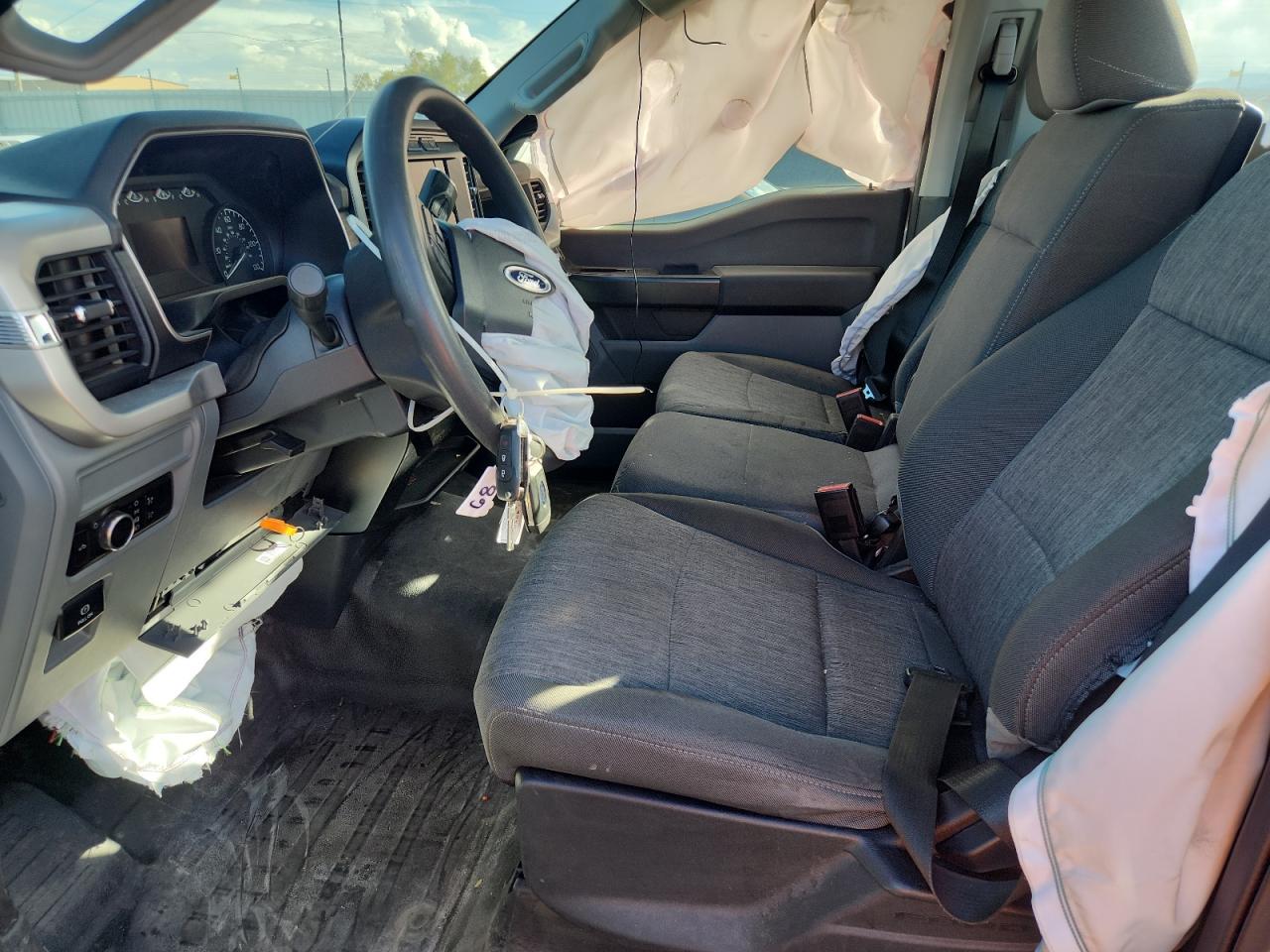 2023 Ford F150 VIN: 1FTMF1C55PKE33356 Lot: 82404845