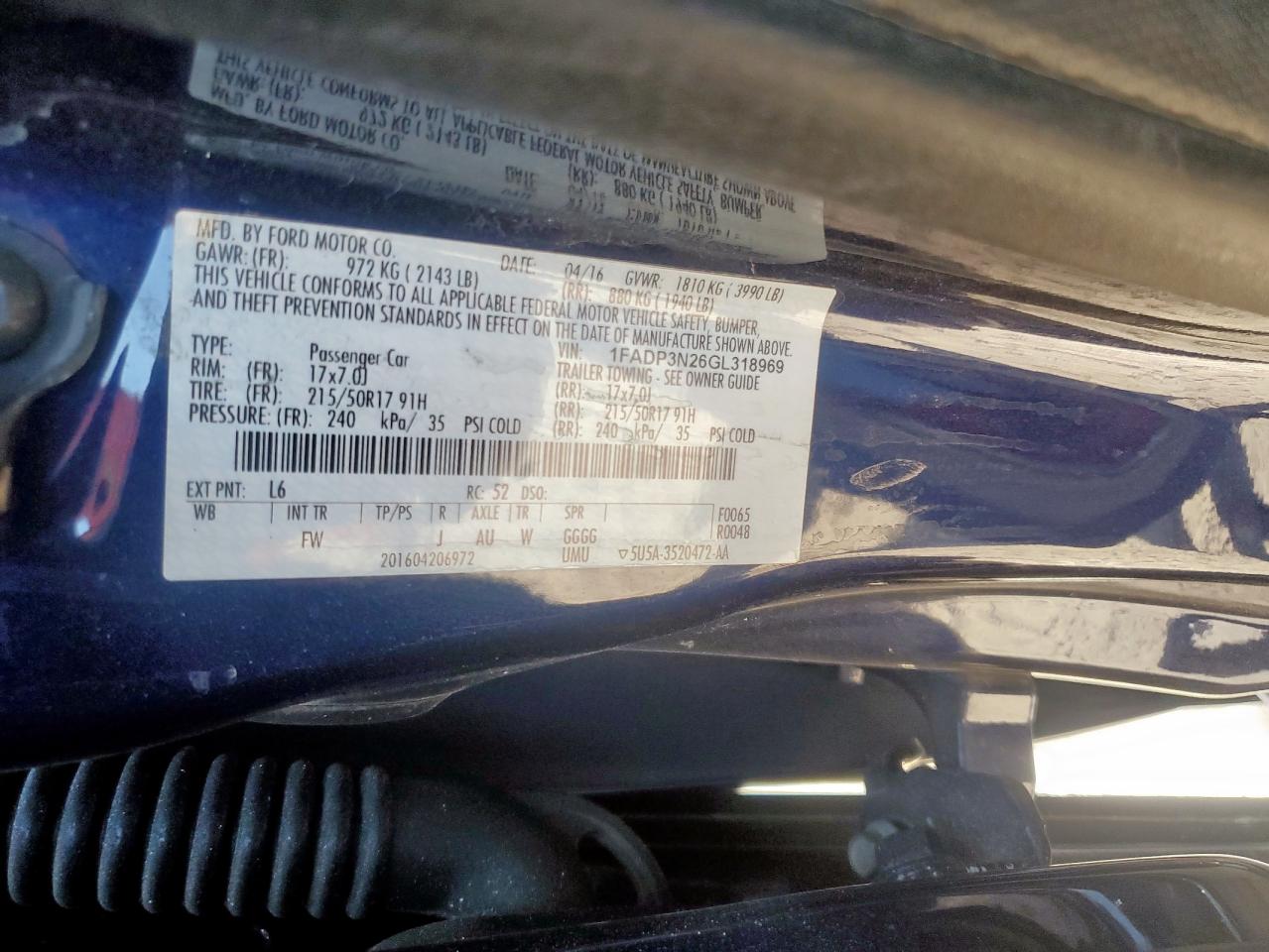 2016 Ford Focus Titanium VIN: 1FADP3N26GL318969 Lot: 86491765