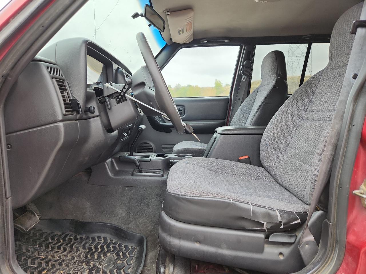 1999 Jeep Cherokee Sport VIN: 1J4FF68S0XL595758 Lot: 85524375