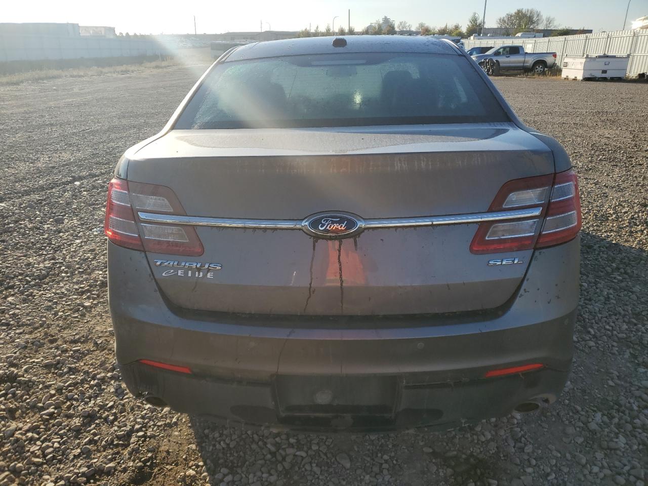 2014 Ford Taurus Sel VIN: 1FAHP2E85EG103833 Lot: 82379105