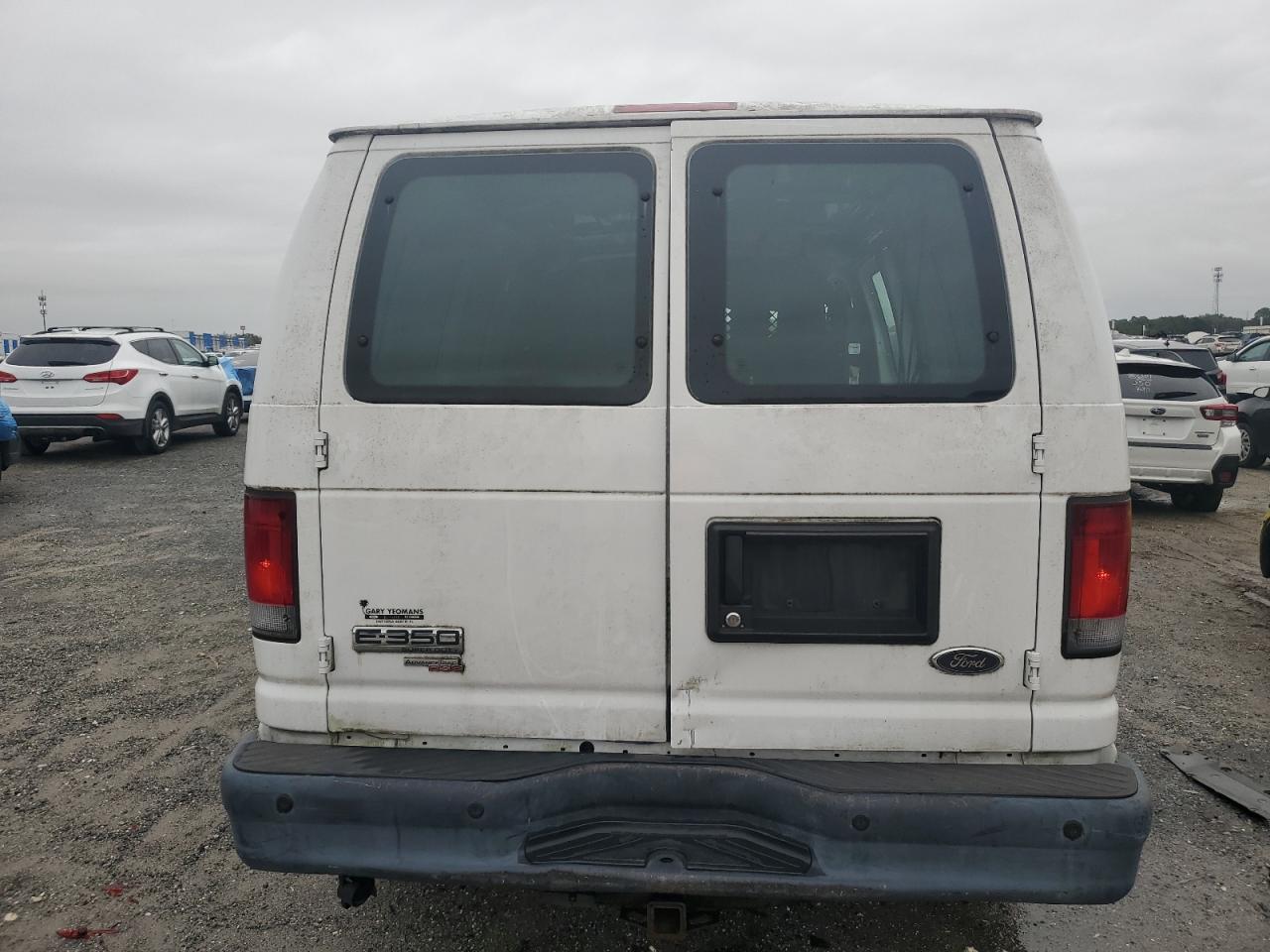 2012 Ford Econoline E350 Super Duty Van VIN: 1FTSE3ES0CDA08778 Lot: 90087105